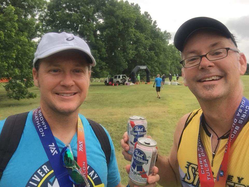 Thomas Gibson and Andy Gibb celebrate thier first duathlon finish at the 2018 Chris Brown Duathlon