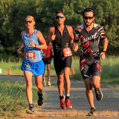 April Schroff, Jorge Yubank, and Casper Shoghi lead the first leg of the 2020 Chris Brown Duathlon. Photo © 2020, Arnold Begay.