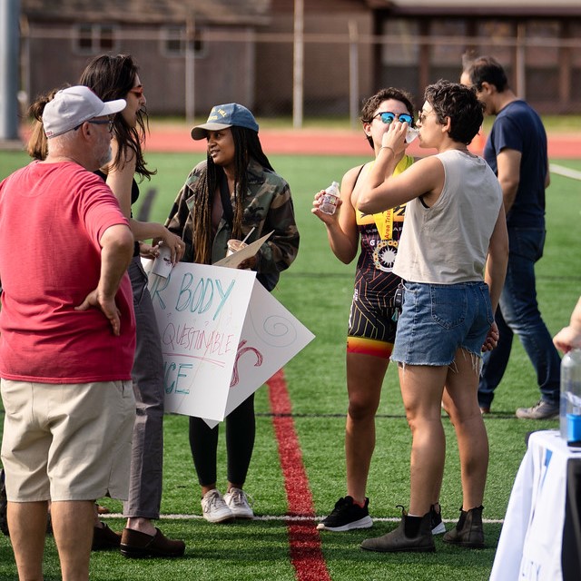 Friends and family gather at the Finish line festival during the 2023 Spring Fever Sprint Triathlon