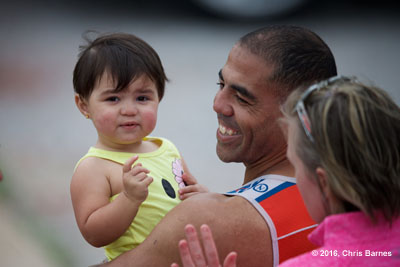 A family gathers at the Finish line festival during the 2016 Spring Fever Sprint Triathlon