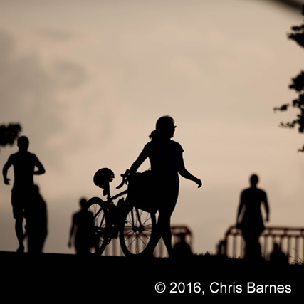 Racers arriving before sunrise to setup in the Tulsa Triathlon transition area